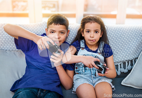 Image of Console, portrait of children playing video games and on sofa in living room. Bonding time or happiness, technology and fun with kids or siblings with wireless remote controls on couch at their home