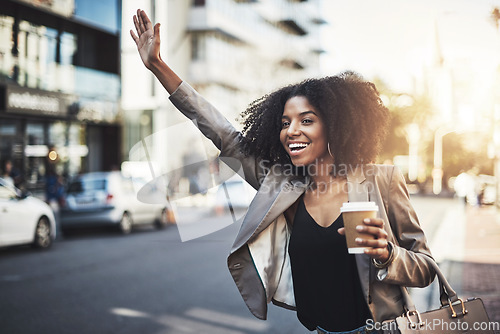 Image of Woman, travel and hands in city for taxi, lift or street transportation with coffee outdoors. Happy female person waving hand and waiting for transport, ride or pickup on road sidewalk in urban town