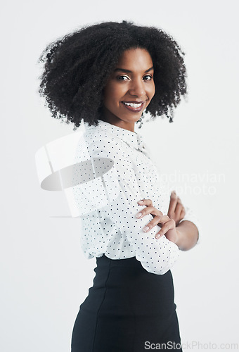 Image of Business, happy and portrait of black woman with arms crossed in studio isolated on a white background. Confidence, face and African female professional, entrepreneur or person from South Africa.