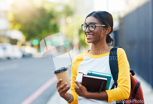 Image of City walk, books and happy woman, student or person on commute journey to university, college or high school. Sidewalk, education study and Indian girl smile for learning, studying or scholarship