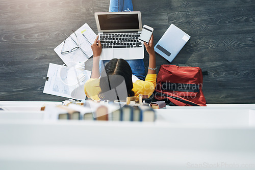 Image of Student laptop, phone screen and top view woman typing research project, university paper or study for college exam. School library, floor and e learning person search online for education info