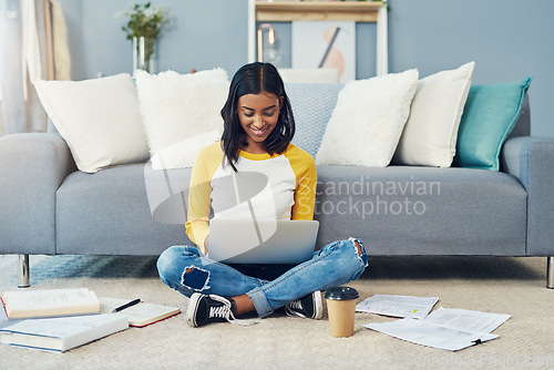 Image of Student laptop, floor and happy woman typing research project, university school paper or study for college test. Happiness, home lounge or learning person search online web for education information