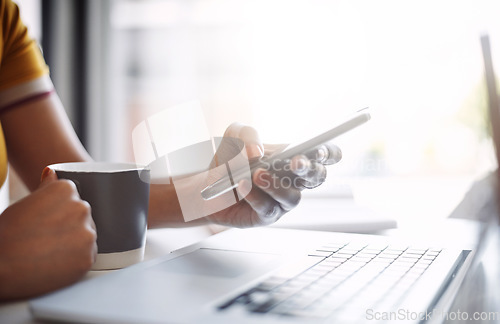 Image of Hands, closeup and scrolling on smartphone with keyboard, coffee and work in home office or shopping, browsing and mobile communication. Woman, social media, and internet or online search with laptop