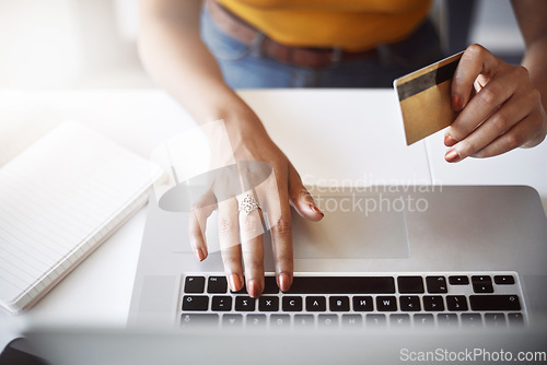 Image of Hands, laptop and above woman with credit card for ecommerce, deal or discount in home office. Online shopping, payment and overhead of lady person with debit, banking or budget, planning or loan