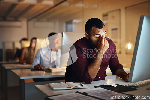 Image of Business, night and man with stress, headache and burnout with new project, deadline and tired. Male person, employee and consultant with a migraine, pain and overworked and professional working late