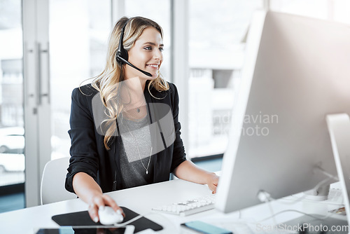 Image of Computer, personal assistant and female receptionist in the office while working on communication. Call center, telemarketing and woman planning a crm strategy with a desktop and headset in workplace