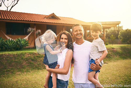 Image of Family, portrait and new home with father, mother and kids with happiness and love. Outdoor, happy and lens flare of a mom, dad and children together in a garden and backyard with a smile and care