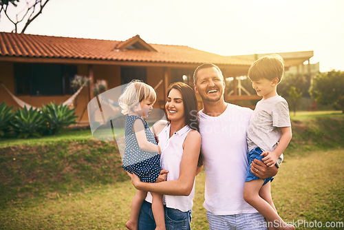 Image of Family, laugh and new home with father, mother and kids with happiness and love. Outdoor, bonding and lens flare of a mom, dad and children together in a garden and backyard with a smile and care