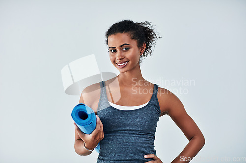 Image of Yoga, fitness and portrait of woman with mat for wellness, exercise and healthy body on white background. Happy, pilates mockup and female person ready for workout for balance, wellbeing and training