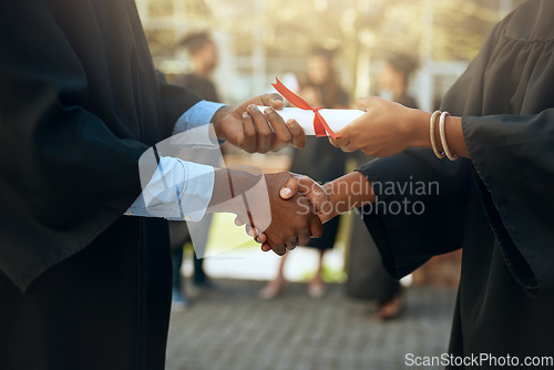 Image of Handshake, graduation and hands with certificate at a college for education or scholarship. Support, thank you and a university graduate shaking hands with a teacher for certification and achievement