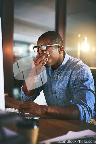 Image of African business man, tired and fatigue in night, office and headache by computer for project deadline. Black businessman, burnout or stress in workplace by pc, web design startup and mental health