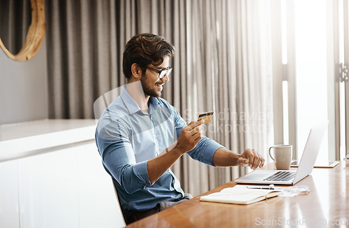 Image of Happy man, credit card and laptop in work from home office, online shopping and fintech payment of budget. Male person, computer and ecommerce banking for finance, investment and internet transaction