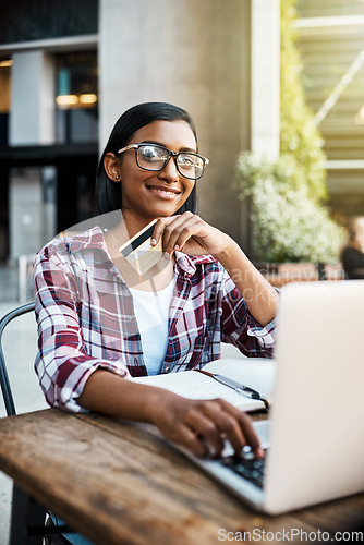 Image of Happy woman, laptop and portrait of student with credit card for ecommerce, payment or campus loan. Female person or university learner smiling with computer and debit for online shopping or banking