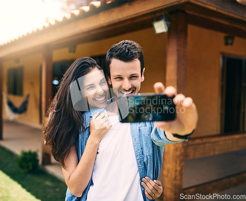 Image of Happy couple, hug and smile for selfie, photo or profile picture together and social media vlog outdoors. Man and woman hugging and smiling for memory, online post or capture with phone outside home