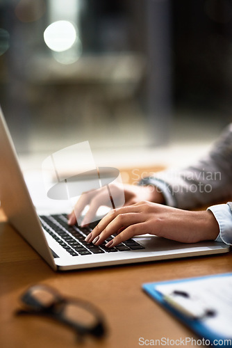 Image of Laptop, email and hands of a person at a desk for work, internet and connection at night. Business, corporate and a secretary or receptionist typing on a computer for late admin online in an office