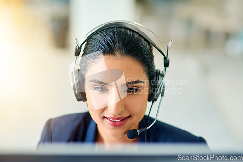 Image of Call centre, agent and woman in headset with mic or employee on computer for consulting or customer support in the office. Operator, telemarketing and talking with customer online with advice