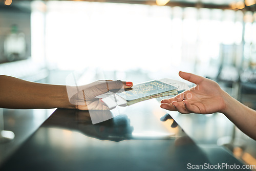 Image of Hands, passport and airport service counter closeup or boarding flight, support and travel desk consultant. Travelling agent, checkin and person help traveller with id book, ticket and safe journey