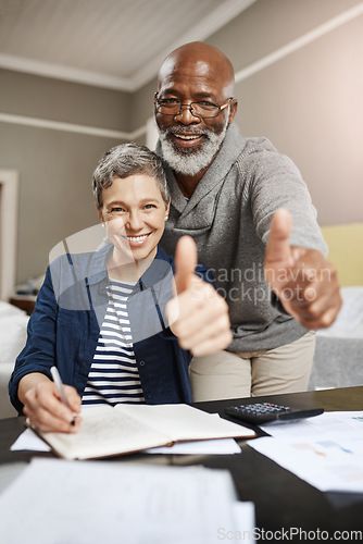 Image of Thumbs up, portrait and senior couple planning, asset management and financial success, winning or thank you. Happy face, finance or interracial people, woman or partner like, yes or ok hands at home
