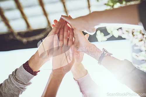 Image of Business people, hands and high five for teamwork, success or winning in unity or collaboration outdoors. Group touching hand in agreement, meeting or team building in win together at the workplace