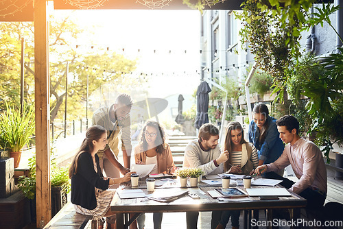 Image of Creative business people, meeting and planning in team collaboration, strategy or discussion for startup. Group of employee workers in teamwork, documents and project plan together at the workplace