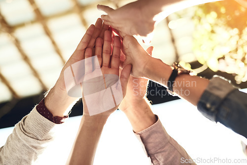 Image of Business people, hands and high five for team building, success or winning in unity or collaboration outdoors. Group touching hand in agreement, meeting or teamwork for win, support or goals together