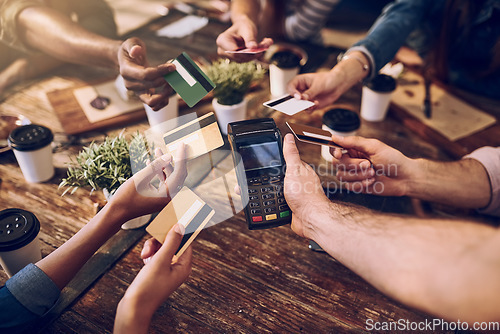 Image of Hands, payment and friends in a cafe, credit card and share bill with offering, online transactions and machine. Closeup, group and people in a restaurant, remote banking and technology with service