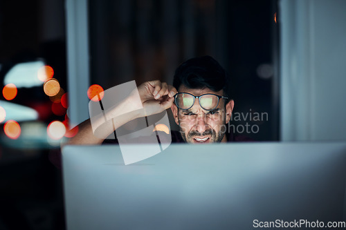Image of Night work, computer and confused businessman in glasses or frustrated with screen, online communication or 404 error. Man, face and reading eyewear or late working with stress, monitor and fail