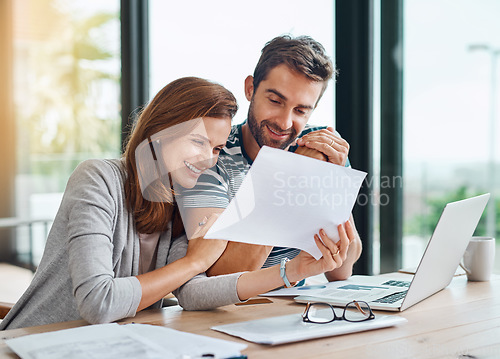 Image of Documents, finance and couple planning budget for tax, bills and savings on laptop with banking, online payment and investment. People, paperwork and happy conversation on financial growth strategy