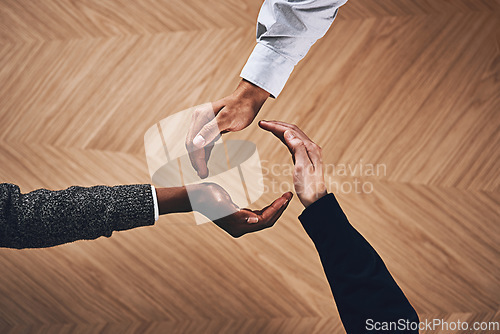 Image of Teamwork, collaboration or hands of business people in circle for motivation, support or recycling in office. Diversity, recycle or top view of employees for goals, community or corporate partnership