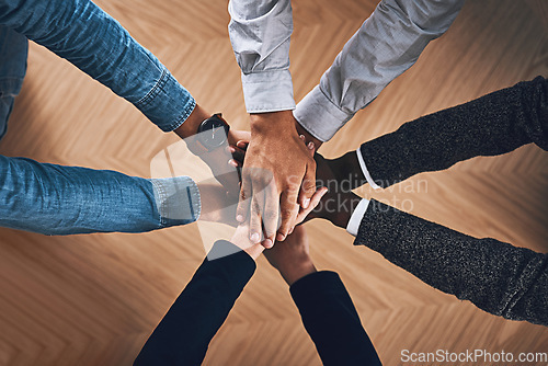 Image of Above, strategy or hands of business people in support for faith, teamwork or partnership in office. Vision, diversity or employees in group collaboration with hope or mission for goals together