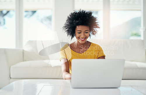 Image of Laptop, smile and relax with black woman in living room for planning, website and remote worker. Blog, networking and social media with female freelancer at home for email, technology and internet