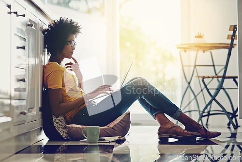 Image of Relax, laptop and thinking with black woman on floor for freelancer, remote work and study. Technology, website and networking with female student at home for blog, email and social media