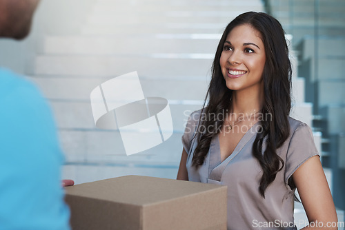 Image of Courier, delivery and happy woman with a package outside her house from ecommerce shopping. Logistics, parcel and young female customer with a cardboard box from a deliveryman outdoor of her home.