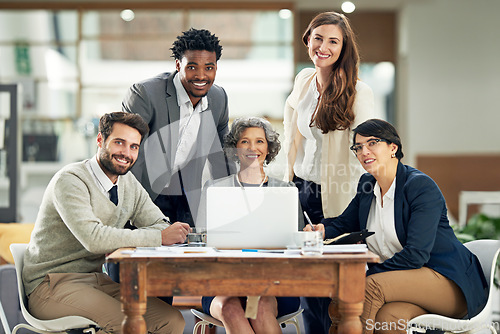 Image of Happy, diversity or portrait of business people in meeting for team strategy or planning a startup company. CEO, laptop or employees smiling with leadership or group support for growth in office