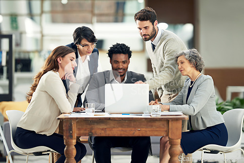 Image of Laptop, teamwork or businessman talking in meeting for ideas, strategy or planning a startup company. People, laptop or employees in group discussion or speaking with leadership for growth in office