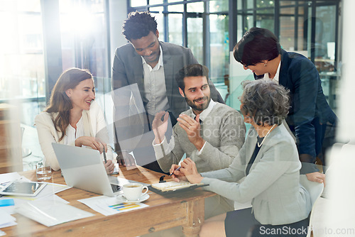 Image of Business people, teamwork or man talking in meeting for ideas, strategy or planning a startup company. CEO, laptop or employees in group discussion or speaking with leadership for a vision in office