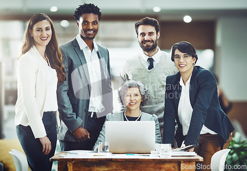 Image of Smile, teamwork or portrait of business people in meeting for ideas, strategy or planning a startup company. CEO, laptop or happy workers smiling with leadership or group support for growth in office