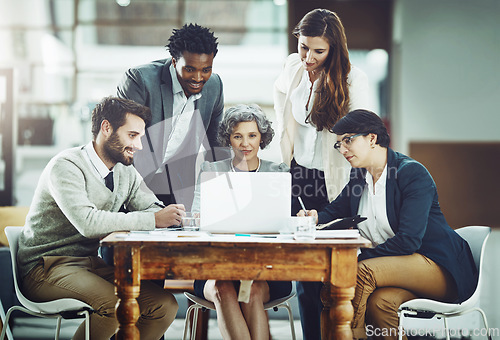 Image of Collaboration, laptop or business people in meeting for ideas, strategy notes or planning a team project. Mentor, manager or employees learning in group coaching with leadership or vision in office