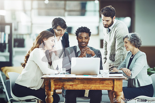Image of Laptop, teamwork or business people in discussion in meeting for ideas, strategy or planning a startup company. Diversity, news or employees talking or speaking with leadership for growth in office