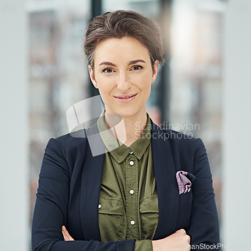 Image of Portrait, business woman and smile with arms crossed in office workplace. Face, confidence and female professional, entrepreneur and person from Australia with happiness, pride for career and job.