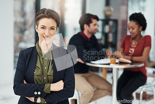 Image of Portrait, business woman and happy with arms crossed in office workplace. Face, confidence and female professional, entrepreneur or person with a smile, pride for career and leadership in company.