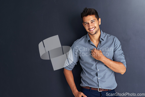 Image of Mockup, portrait and happy business man in studio confident, young and empowered against black background. Face, smile and cheerful male person with positive attitude posing on isolated copy space