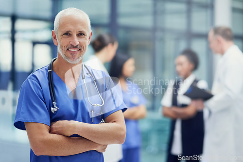 Image of Portrait of senior doctor or nurse with mockup, smile and happiness in hospital, confidence in medical career. Health care, confident help and medicine, happy man or nursing professional in workplace