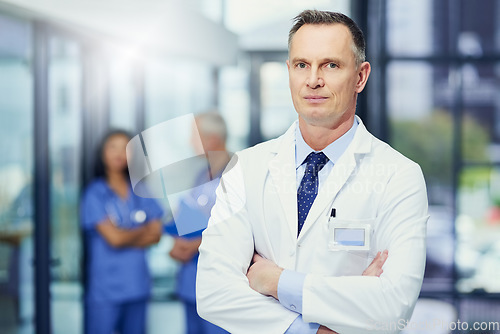 Image of Healthcare, mockup and portrait of doctor with confidence in hospital, support from leader in medical career. Health care, pride and medicine, confident man or professional surgeon in workplace space