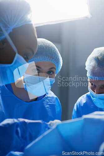 Image of Surgery, operating room and portrait of woman doctor with team, healthcare and teamwork in professional medicine. Medical innovation, emergency and focus, surgeon with expert staff in hospital icu.