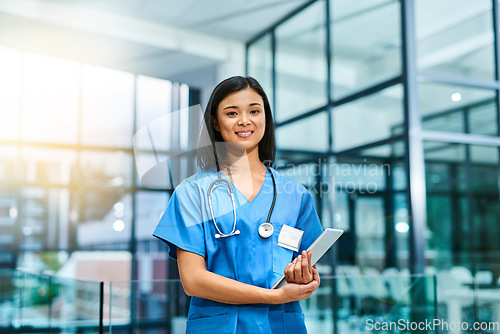 Image of Health care, confidence and woman, portrait of nurse or doctor with tablet in hospital for support in medical work. Healthcare career, wellness and medicine, confident nursing professional with smile