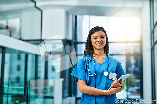 Image of Healthcare, confidence and portrait of woman doctor or nurse with tablet in hospital for support in medical work. Health care career, wellness and medicine, confident nursing professional with smile.