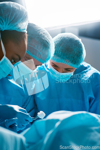 Image of Surgery, operating room and team of doctors with focus for healthcare, teamwork and tools for professional medicine. Medical innovation, health care and surgeon with expert staff in hospital icu.