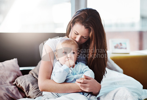 Image of Baby, mother and hug in bed with love or bedroom, peace in morning and newborn together, relax and calm mom in home. Postpartum, boy and quality time with mama to enjoy, support or care for child