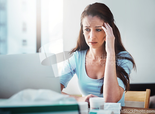 Image of Stress, headache and woman doing research on a laptop for her sickness, illness or disease. Burnout, allergies and female person with a migraine in pain on a telehealth call on a computer in her home